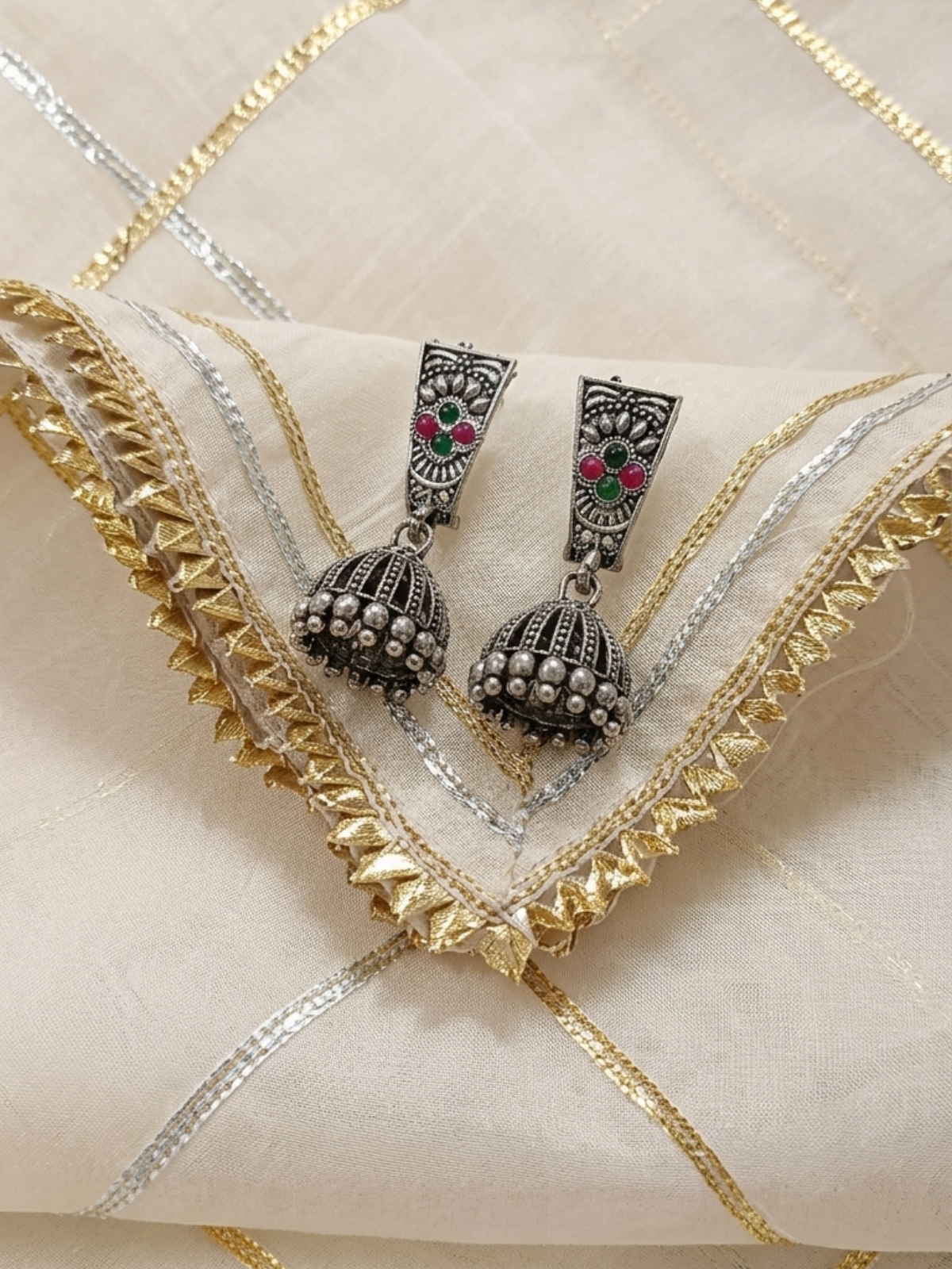 Pink and green gemstone studded oxidised silver jhumka earrings for girls & women