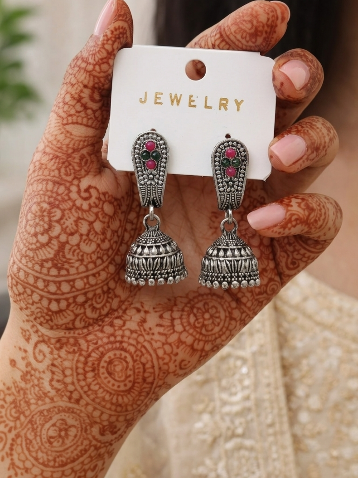 Pink and green gemstone studded oxidised silver jhumka earrings for function, party & wedding