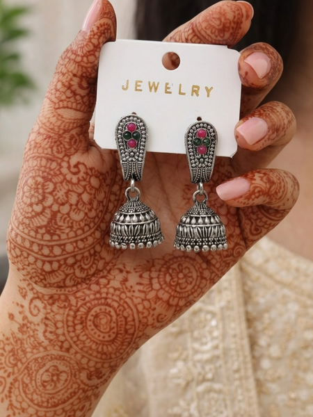Pink and green gemstone studded oxidised silver jhumka earrings for function, party & wedding