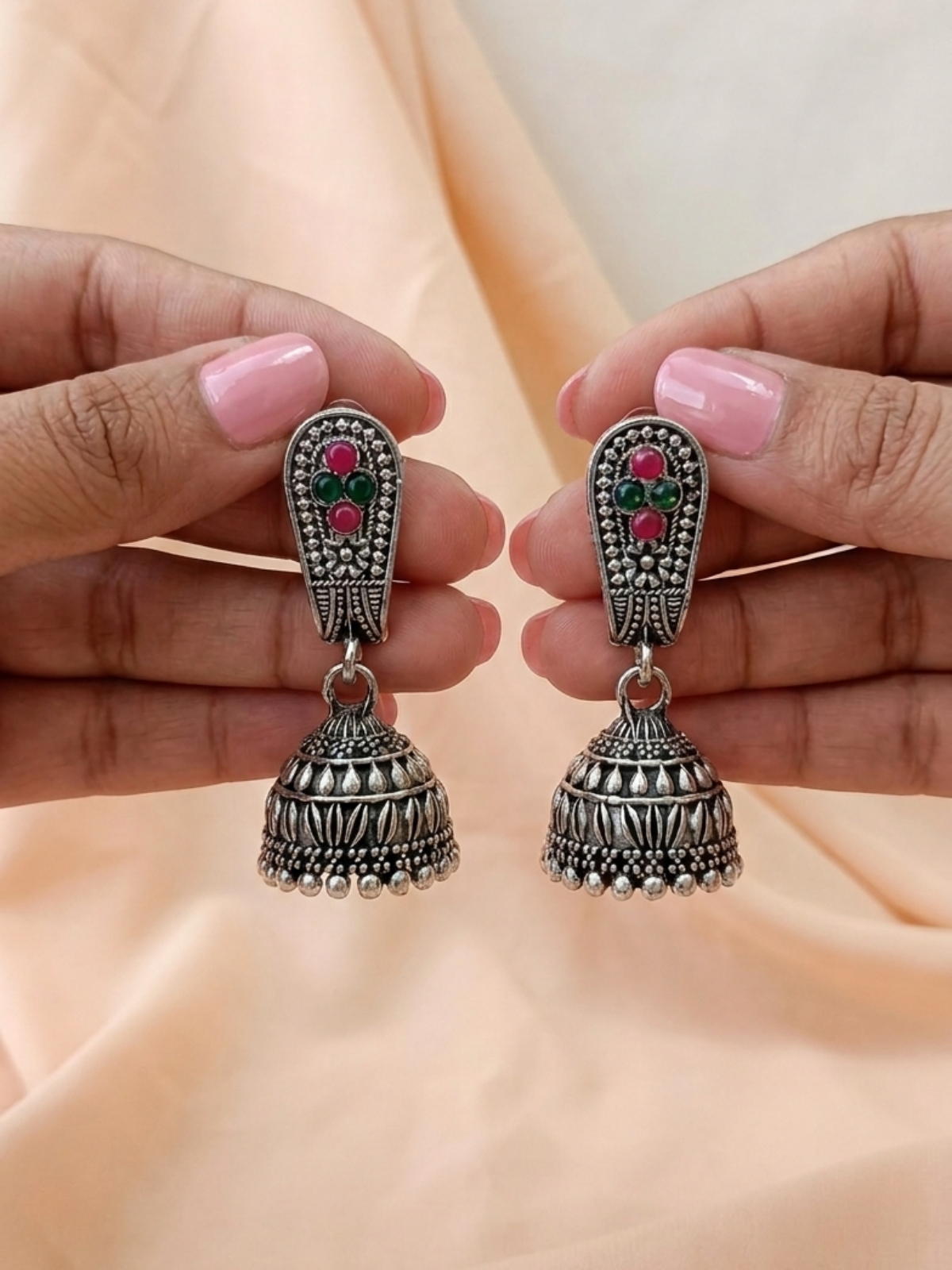 Pink and green gemstone studded oxidised silver jhumka earrings for function, party & wedding