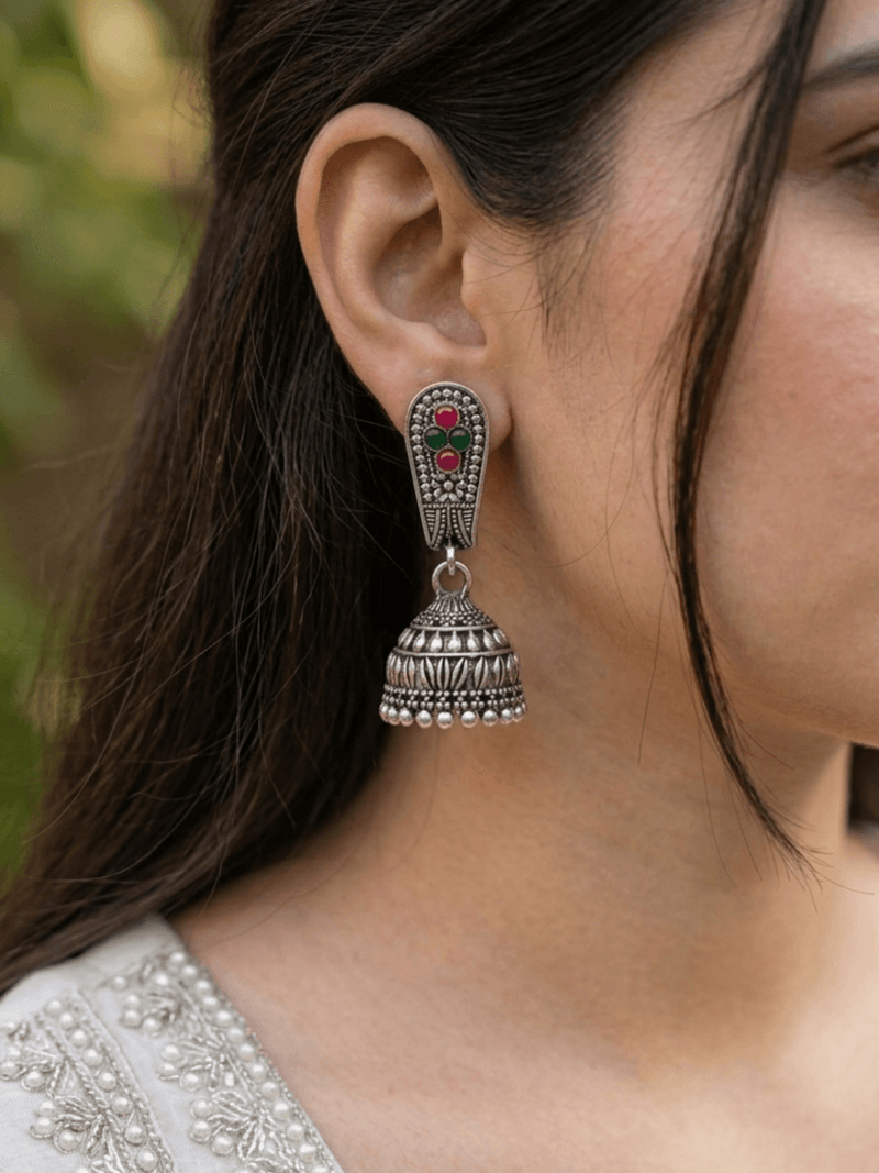 Stone studded Oxidised Silver Jhumka Earrings with pink and green gemstones