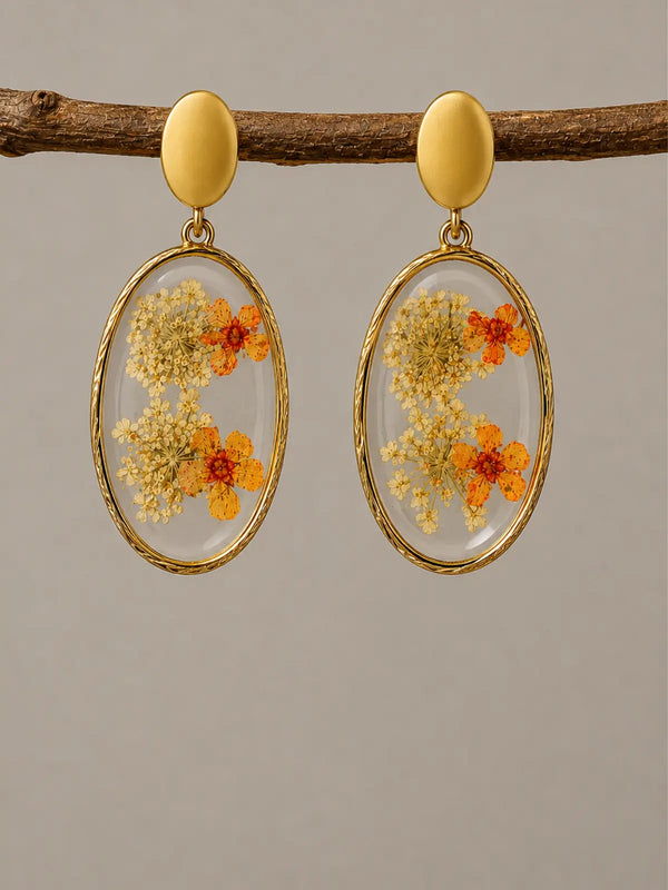 Orange and white dried flower resin earrings