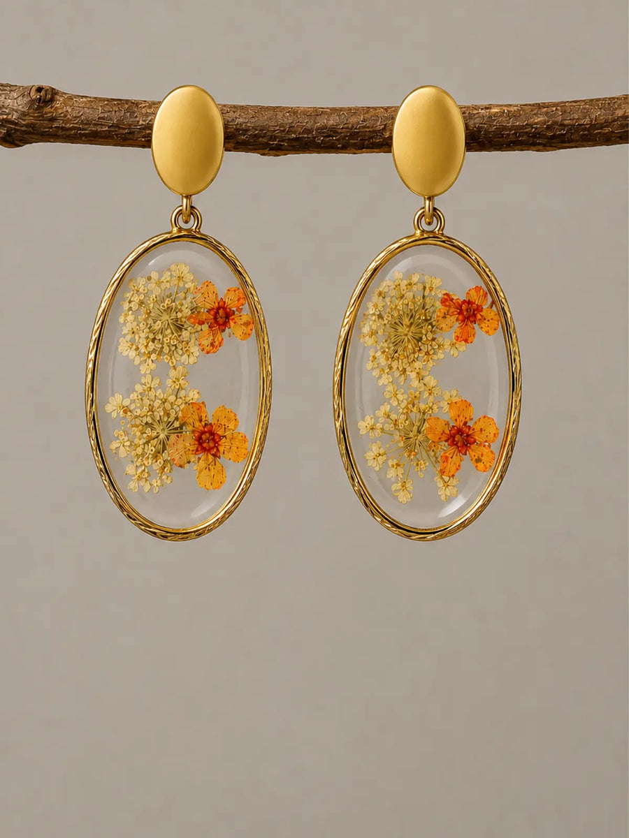 Orange and white dried flower resin earrings