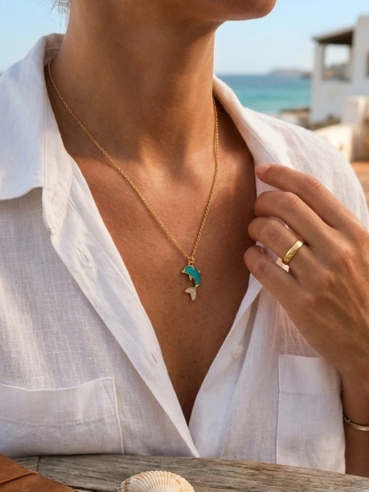 Blue crystal dolphin pendant necklace styled for beach fashion