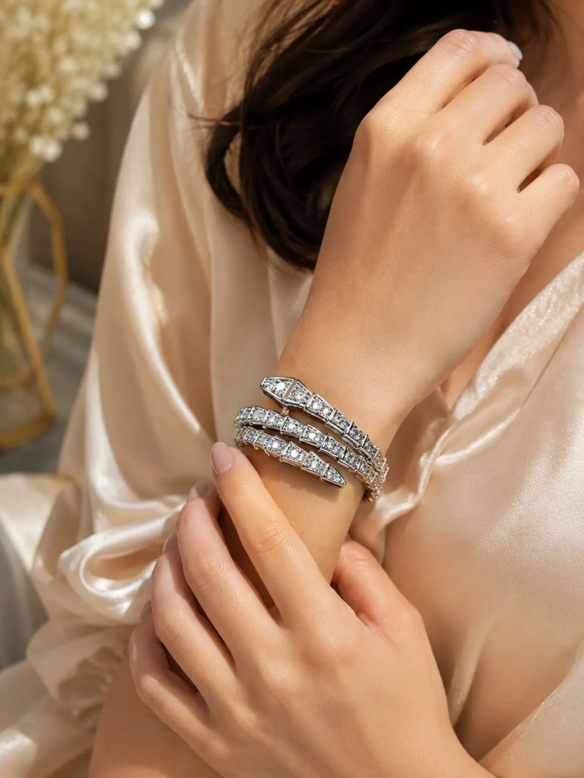 Silver snake bracelet for women with sparkling stone detailing