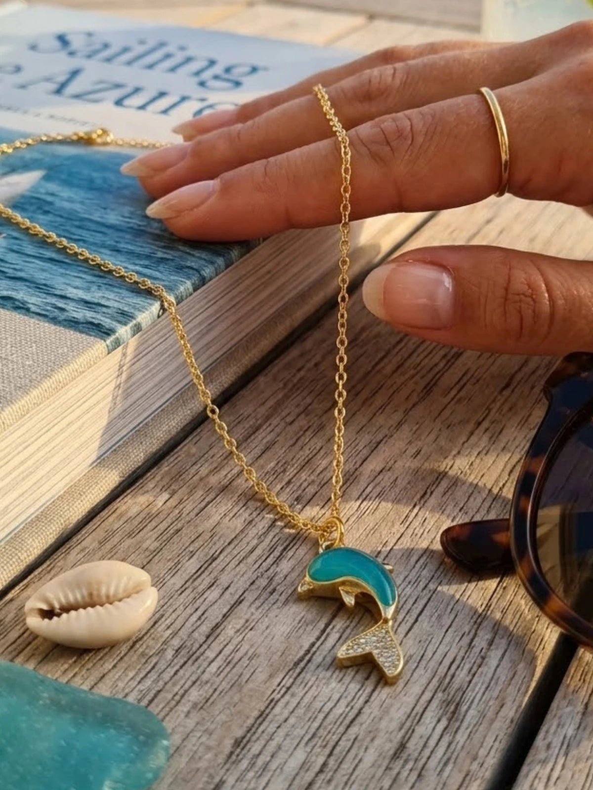  Ocean-inspired blue dolphin charm necklace