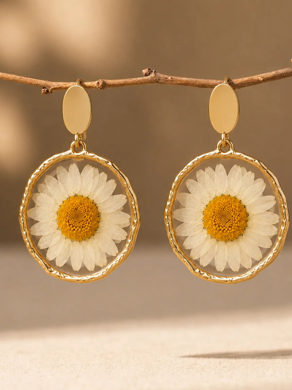 Sunflower drop earrings with transparent resin and gold frame