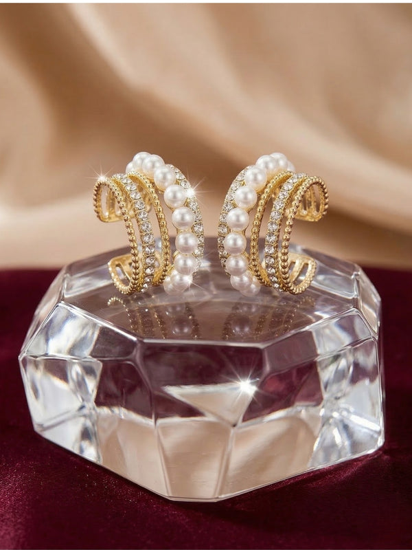 Pearl Stud Earrings with elegant C-shaped white pearl design