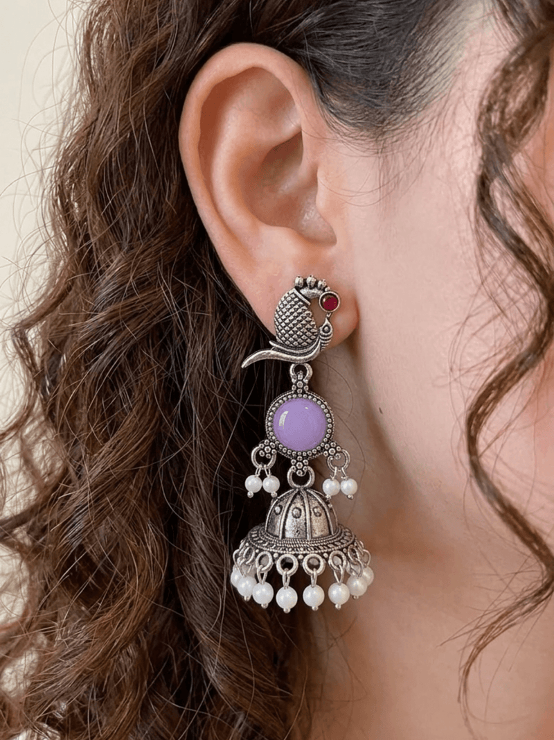 Oxidised Silver Earrings featuring traditional peacock jhumka design