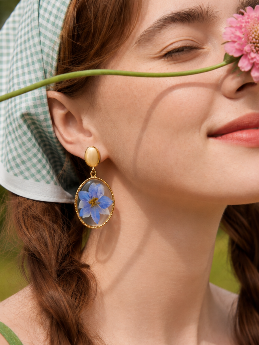 Real pressed blue flower earrings