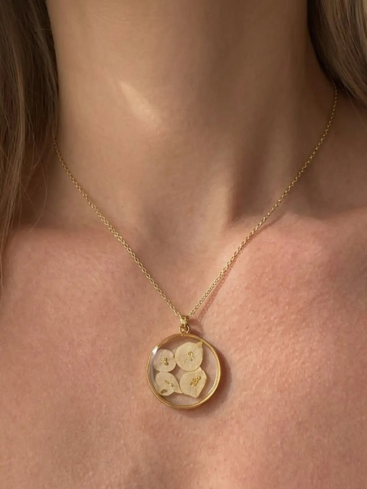 Nature-inspired gold floral necklace